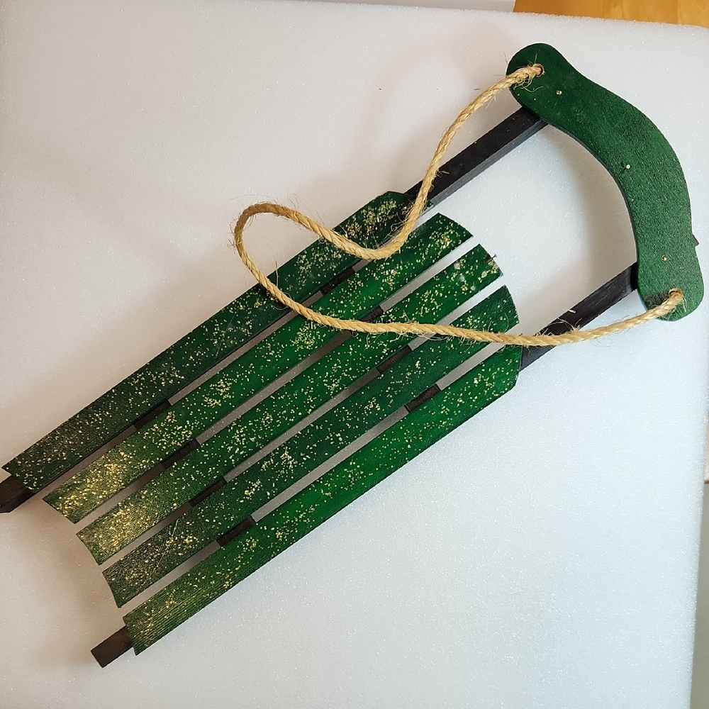 Green Wooden Sled with Rope Handle